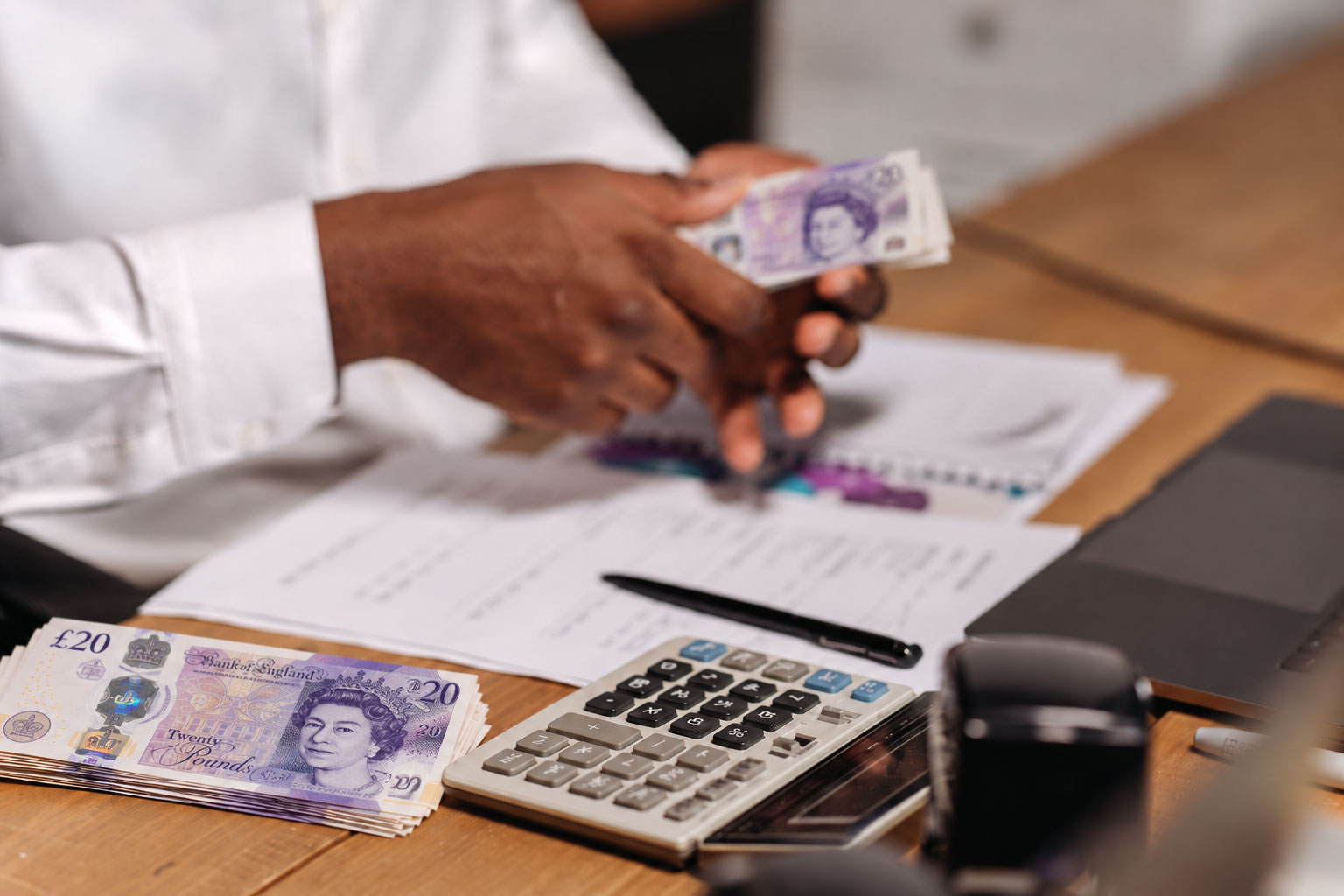 Person working from home with income protection in place